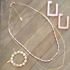 Jewelry set includes bracelet, necklace and earrings